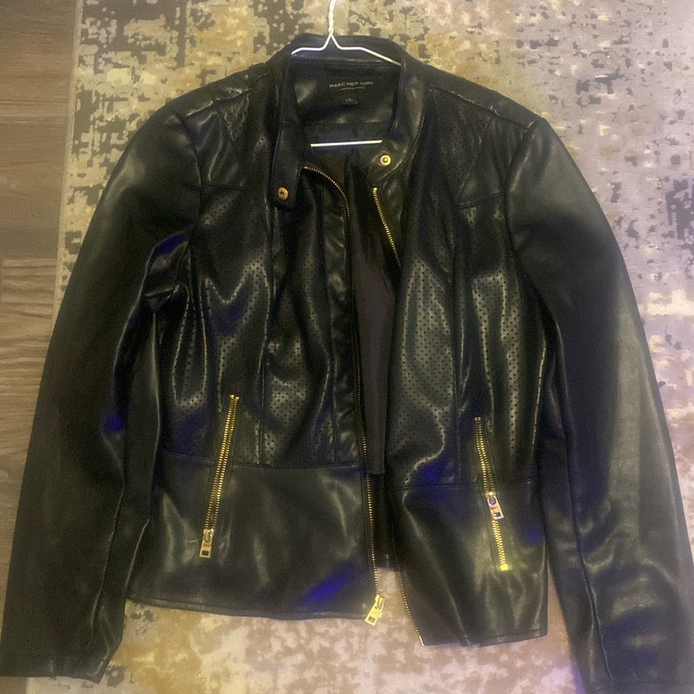 Cute little black jacket.  Looks great with jeans.  Lightweight